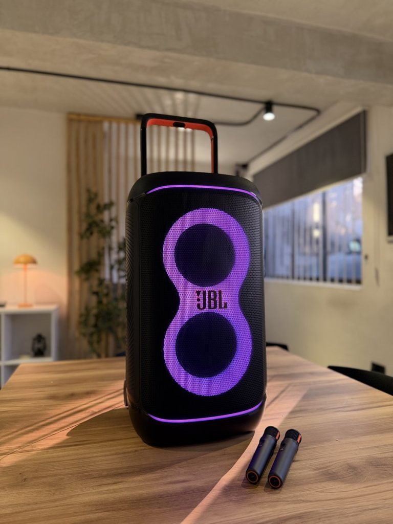 JBL Bluetooth PA speaker with purple LED lights and wireless microphones for rent in Lagos